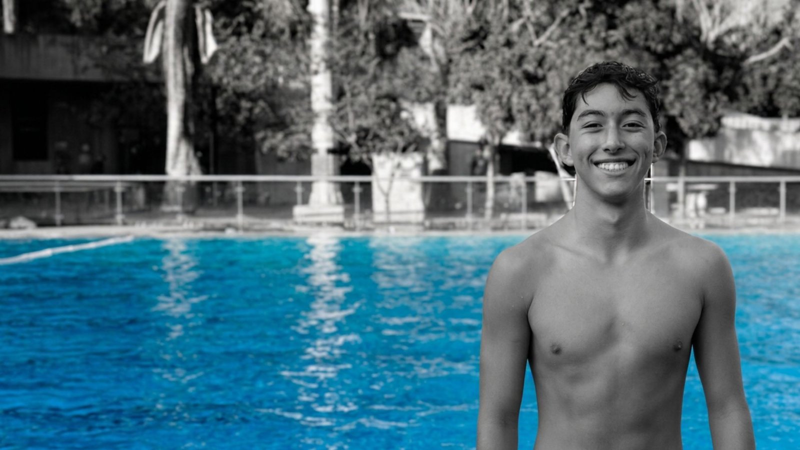 Konsta smiling by the pool